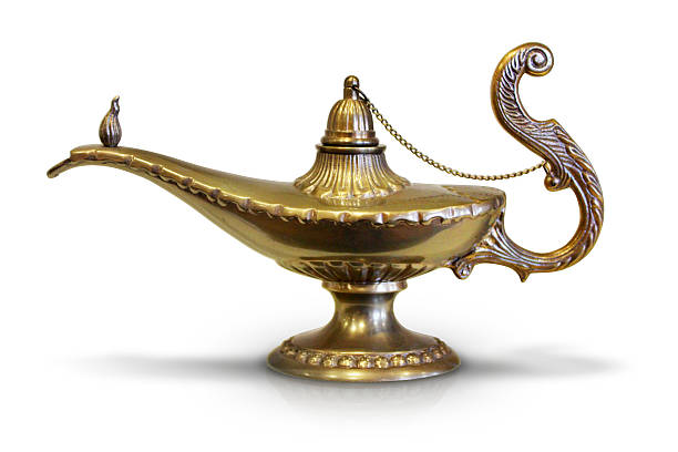 Magic Genie Lamp Isolated profile shot of a genie lamp. magic lamp photos stock pictures, royalty-free photos & images