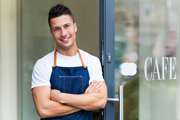 istock Man standing in front of coffee shop 492260506