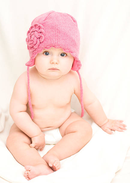 Little girl in pink hat. stock photo