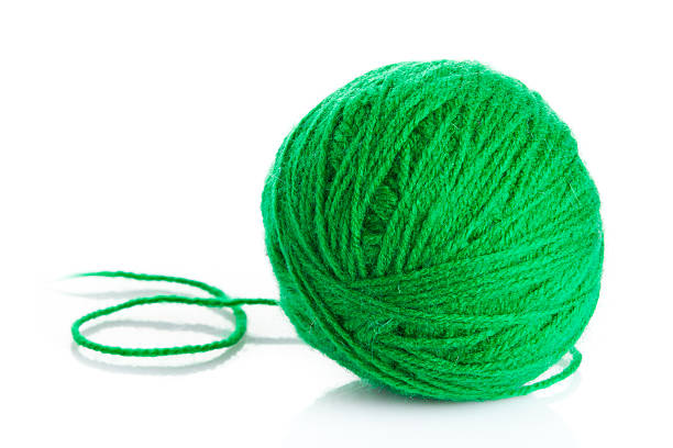 istock wool yarn ball isolated on white. 492261539