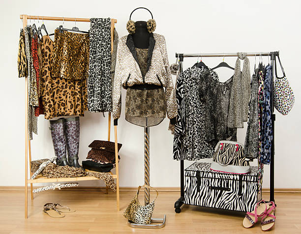 istock Colorful wardrobe with jungle pattern clothes and accessories. 492261593