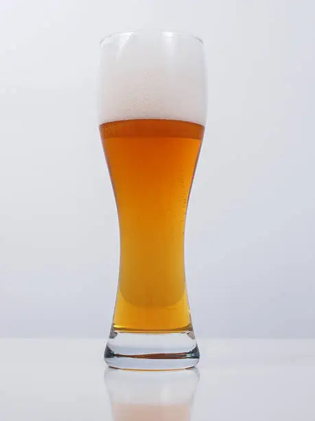 A glass of German weiss weizen beer