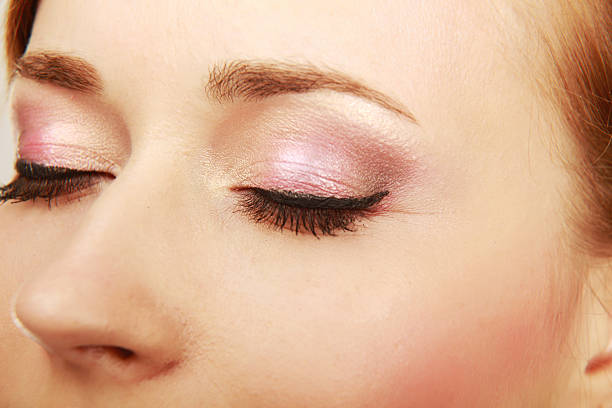 istock Close up of creative make up on female eye 492261965