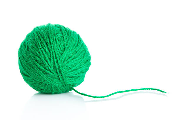 istock wool yarn ball isolated on white. 492262179