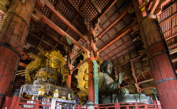 Great Buddha and kokuzo bodhisattva Nara, Japan - October 6, 2015: The Daibutsuden at Nara has the world's largest bronze statue of the Buddha and other two Bodhisattava (seen left). nsra stock pictures, royalty-free photos & images