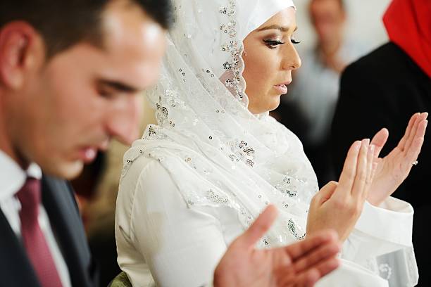 Muslim bride and groom at the mosque stock photo