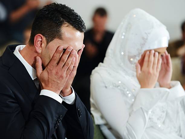 Muslim bride and groom at the mosque stock photo