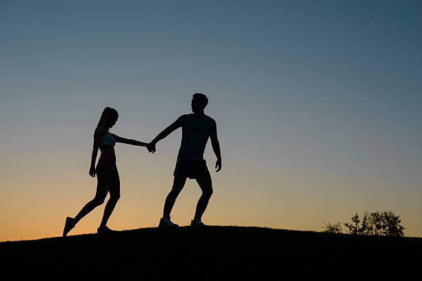 istock Tired athletes climb the mountain. 492273952