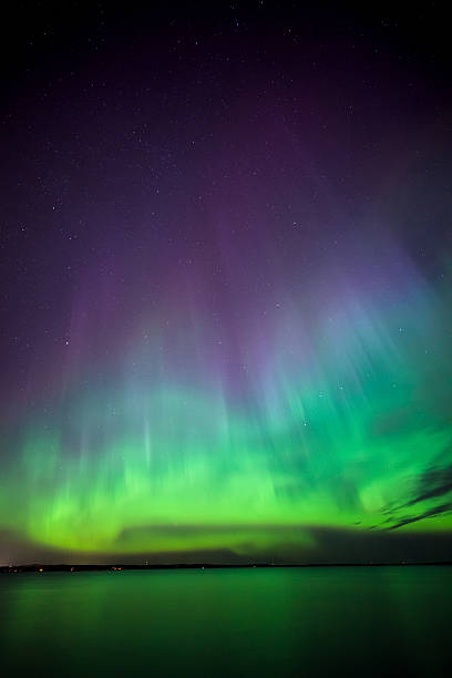 istock Northern lights over lake in finland 492274192