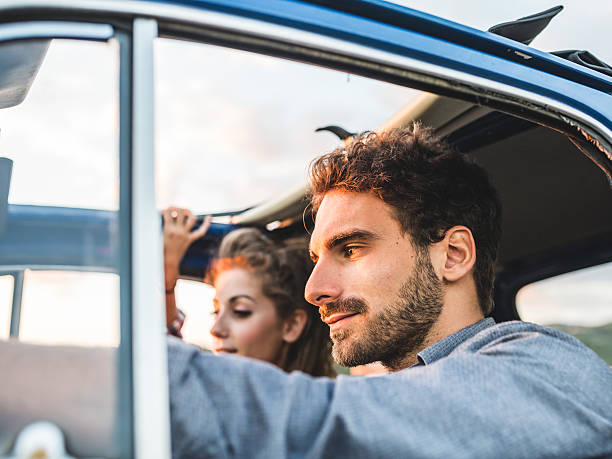 istock Young Couple Trip With Vintage Car 492275254