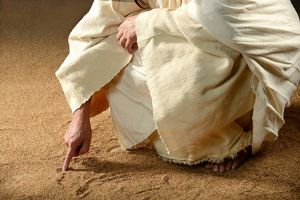 Cтоковое фото Иисуса письменном виде получил песок