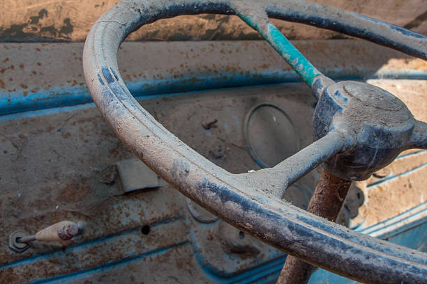 istock Blue dashboard and steering wheel of abandoned car 492279192