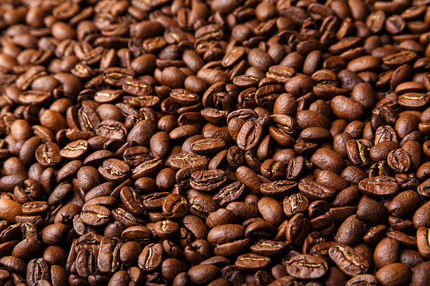 istock Brown coffee beans background closeup 492282118