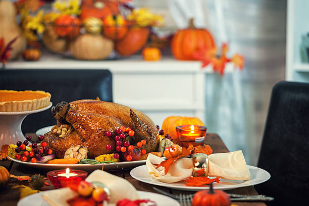 istock Roasted Thanksgiving Turkey with Side Dishes 492284320