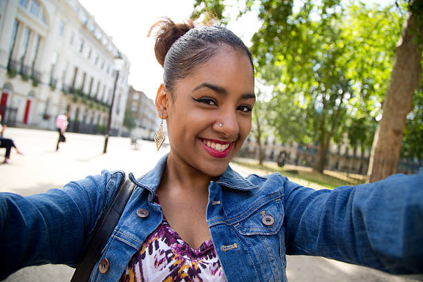 istock girl taking a selfie 492285146