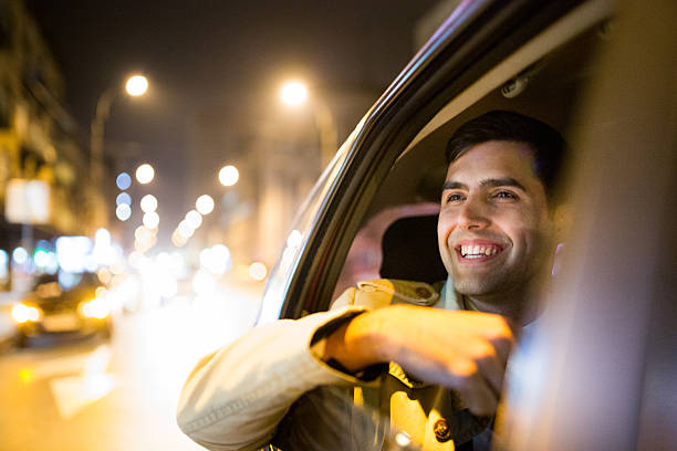 istock Businessman in a car at night 492288072