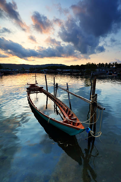istock Half submerged boat on a sea 492296449