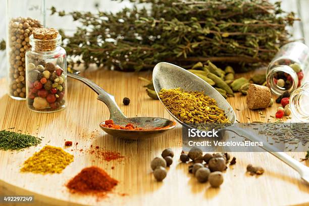 Variety Of Spices And Herb On A Wooden Board Stock Photo - Download Image Now - Asian Culture, Asian Food, Backgrounds