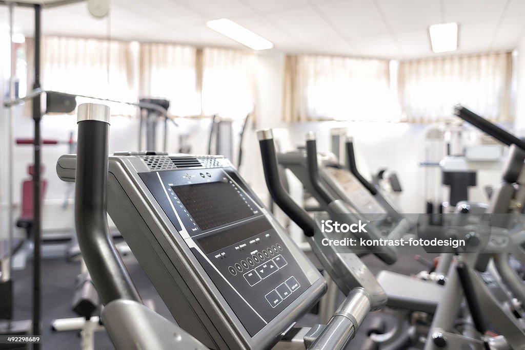 Gym Cross Trainer Ergonometer Cross trainer at a gym, Selective focus Cross Trainer Stock Photo