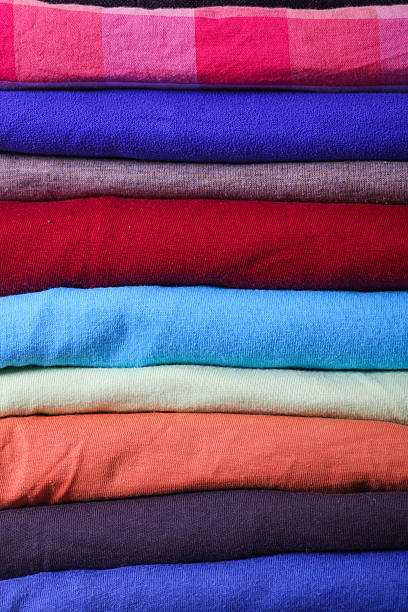 istock Pile of colorful clothes 492299597