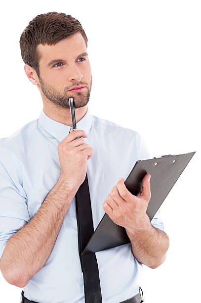istock Businessman with clipboard. 492300033