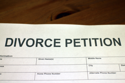 Someone filling out Divorce Petition Form