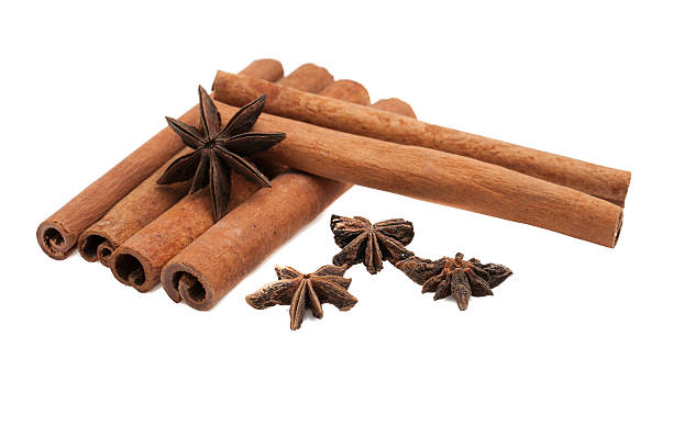 cinnamon  and star anise cinnamon  and star anise isolated on white background. kayu manis stock pictures, royalty-free photos & images