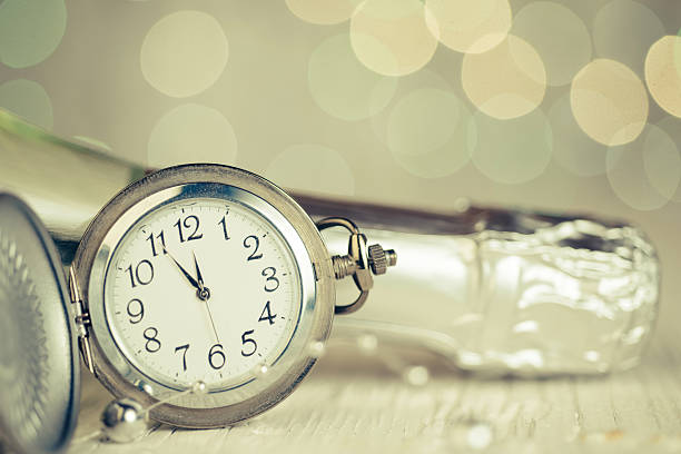 istock Champagne and pocket watch 492307956