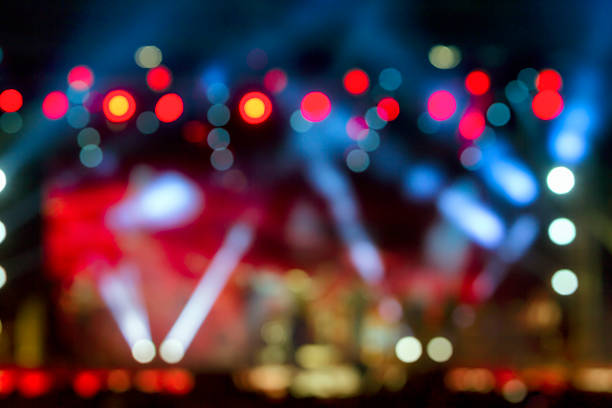 istock Defocused entertainment concert lighting on stage, bokeh. 492311010