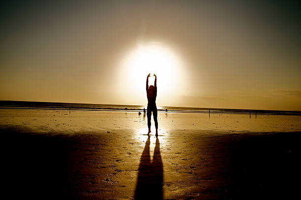 istock Sun energy power hold in human hands. Man on holidays. 492313842