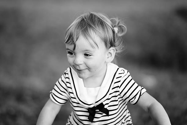 istock Kid at countryside wearing cute dress. 492316408
