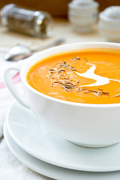 istock Vegetarian carrot-pumpkin cream soup with garlic and cumin 492316948