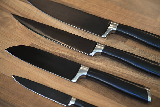 istock Set of kitchen knives on table. 492317808