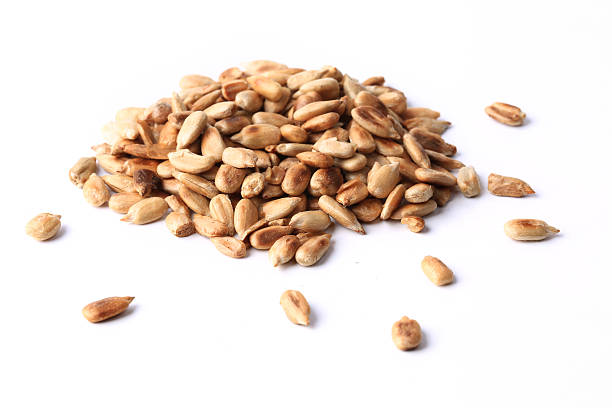 istock sunflower seeds fried peeled isolated on white background 492319548