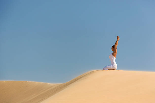 istock Yoga meditation on the beach 492333133