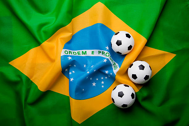istock Brazilian flag with football 492333451