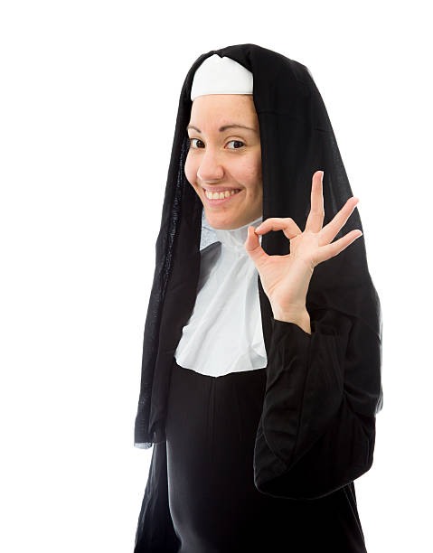 istock Young nun showing ok sign and smiling 492333493