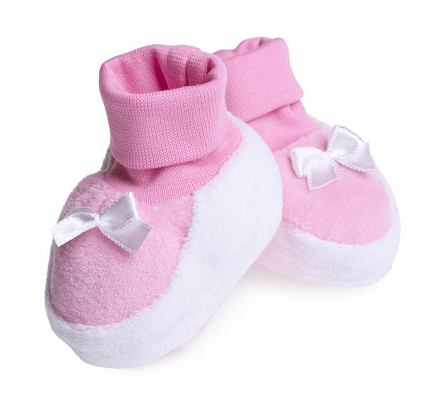 핑크 아기 스니커즈입니다 흰색 바탕에 그림자와 - baby booties studio shot horizontal shoe 뉴스 사진 이미지