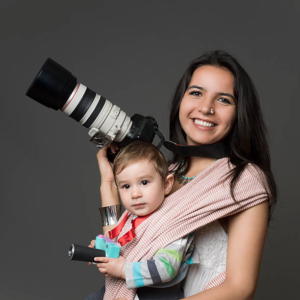 istock Photographer mother and her son ready for shooting 492335107