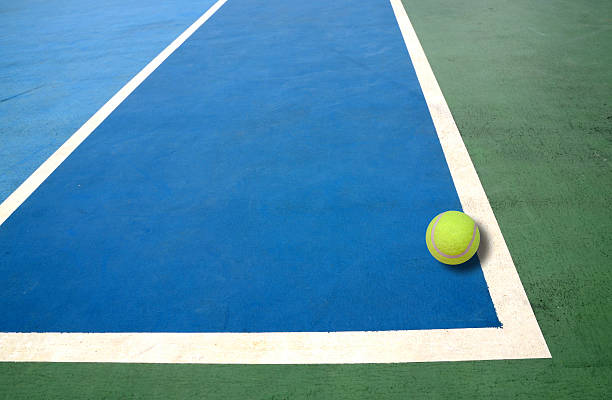 istock Tennis ball on court 492335547