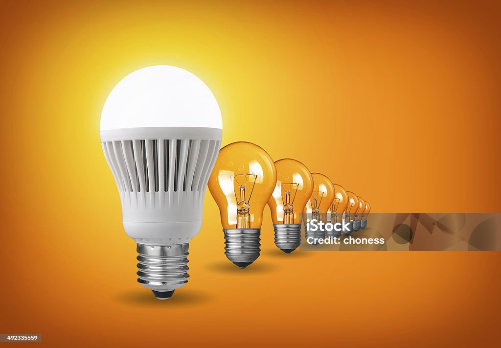 led bulbs Idea concept with led bulb and tungsten bulbs LED Light Stock Photo