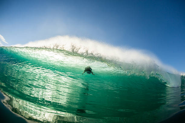 istock Wave Crashing Color Surfer Escape 492335563