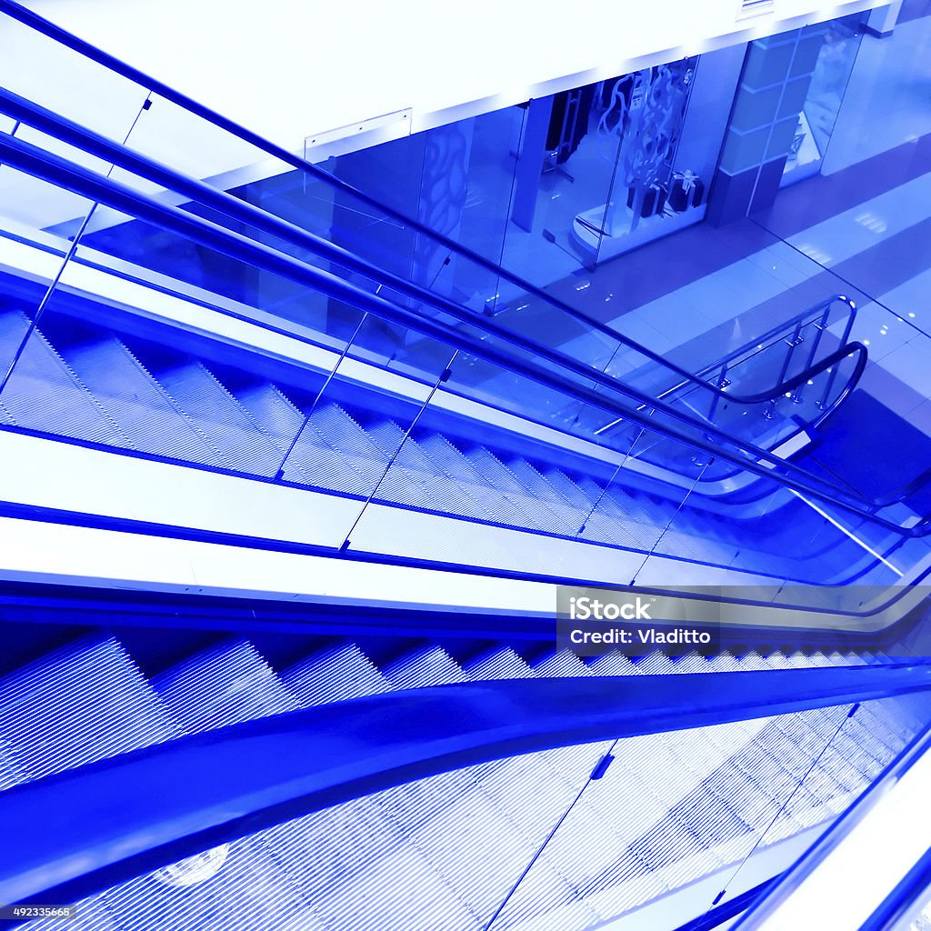 Moving escalator with stairs Moving escalator with stairs in airport Activity Stock Photo
