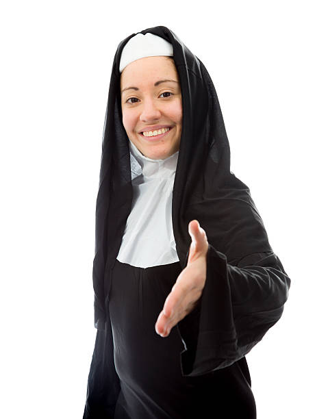 istock Young nun offering hand for handshake 492336083