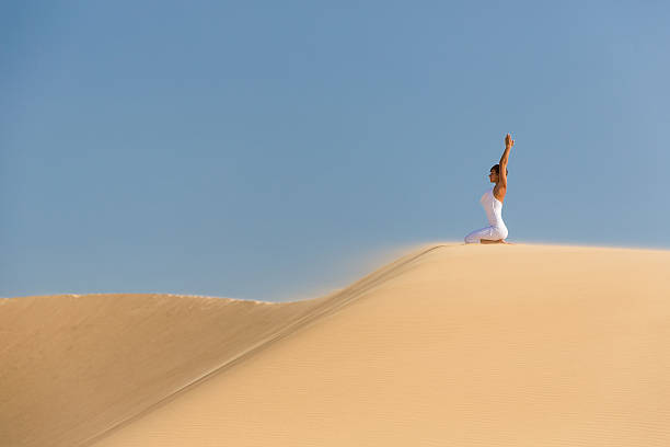 istock Yoga meditation on the beach 492337049