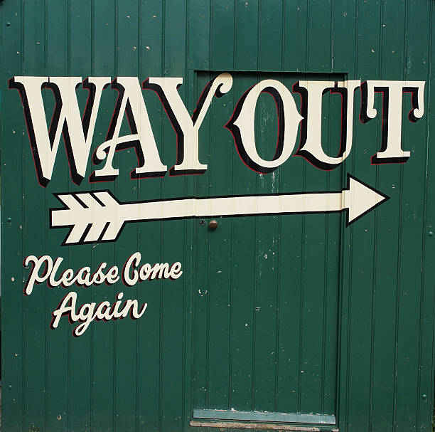 istock Way Out Sign Painted on Shed 492337811