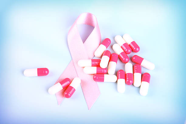 istock Pink Awareness Ribbon with Capsules 492338215