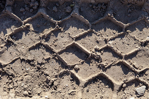 istock Wheel tracks on the ground 492338961