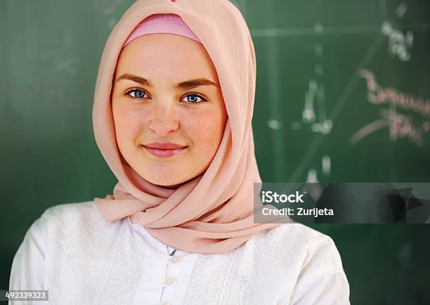 Casual Muslim Arabic Student Looking Happy And Smiling Stock Photo - Download Image Now