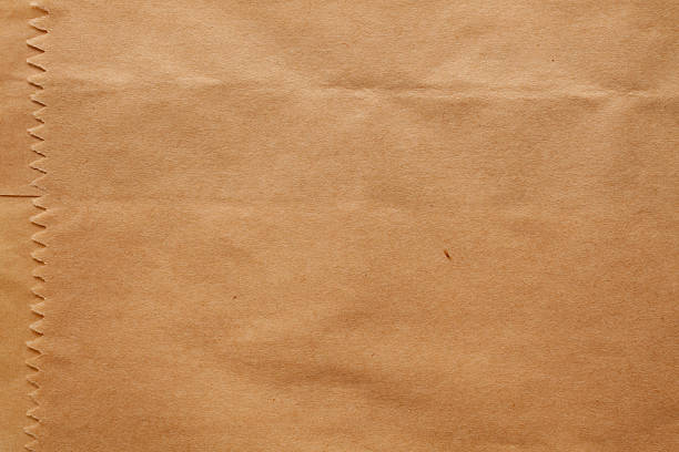 busta di carta texture sfondo - paper bag foto e immagini stock